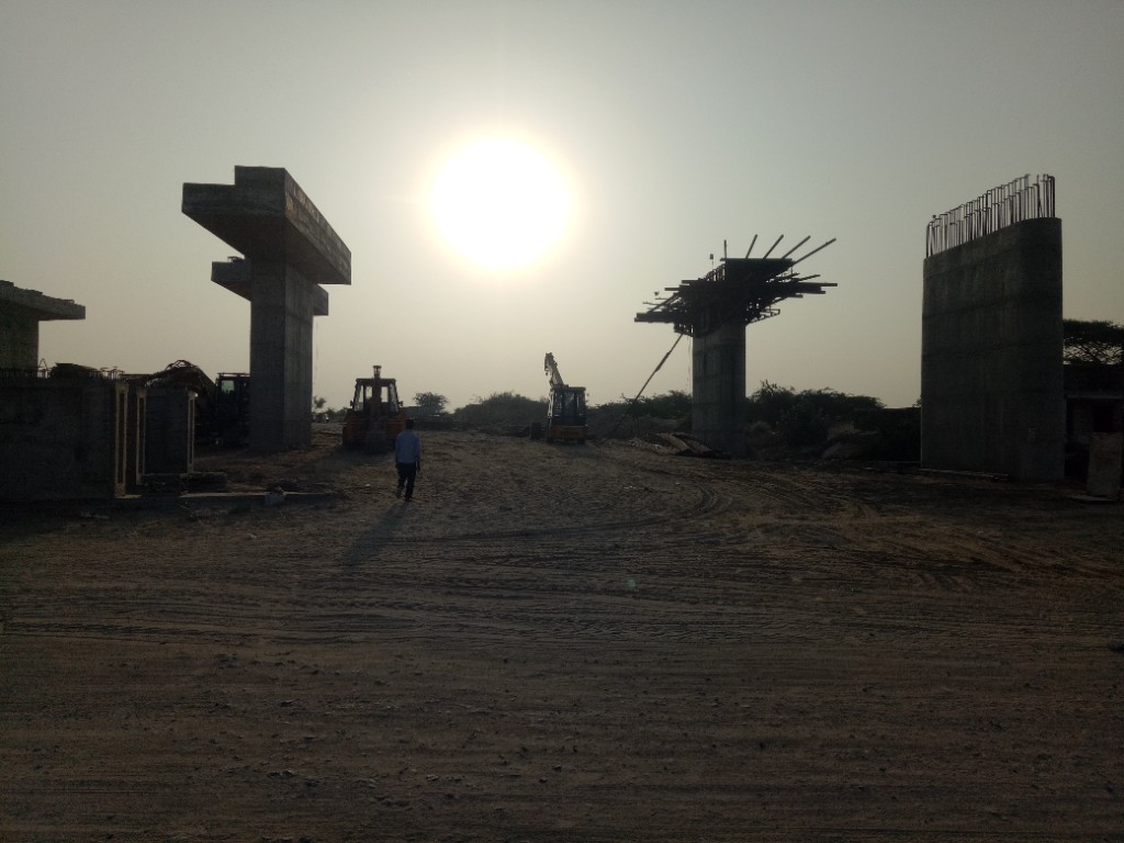 Bridge pier construction at sunrise